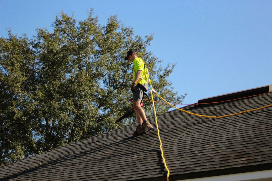 Roofing company worker